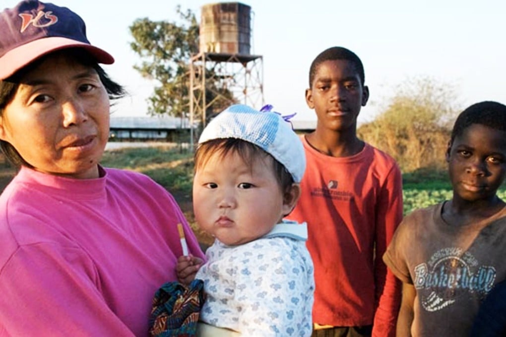 A Chinese farmer and her son with farm workers in Zambia. Many Chinese entrepreneurs are looking to Africa. Photo: SCMP Pictures