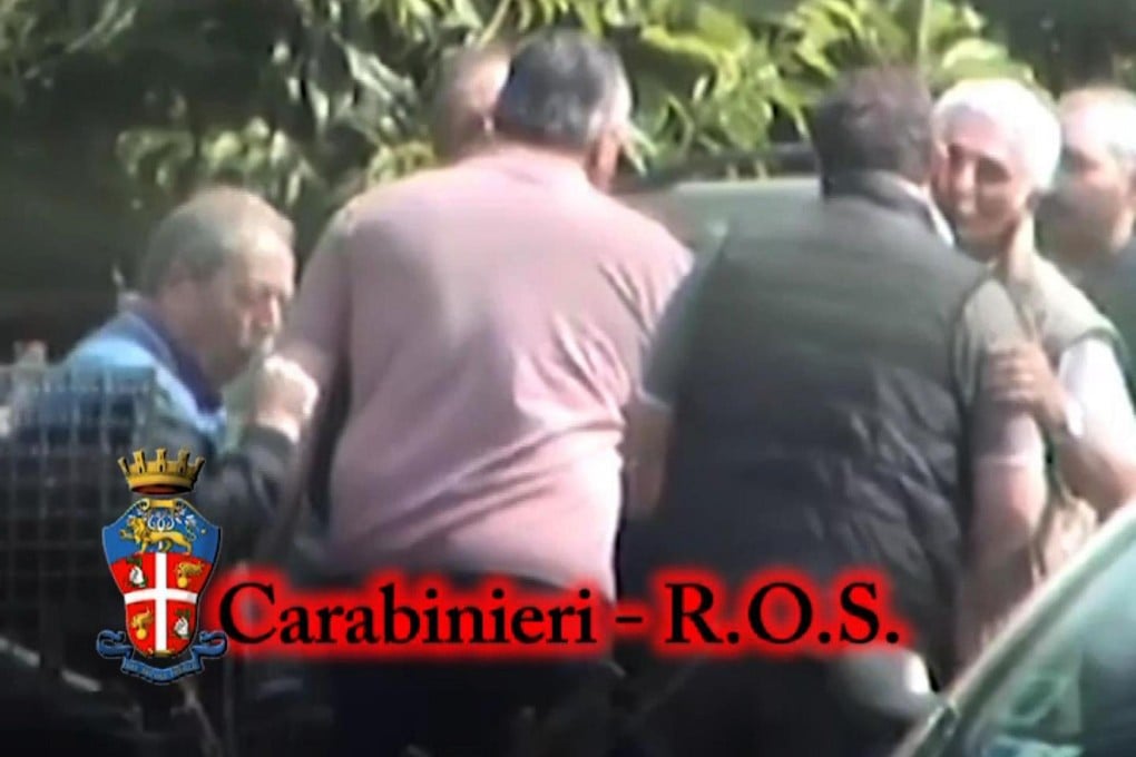 Calabrian 'Ndrangheta members during a meeting. Photo: AFP