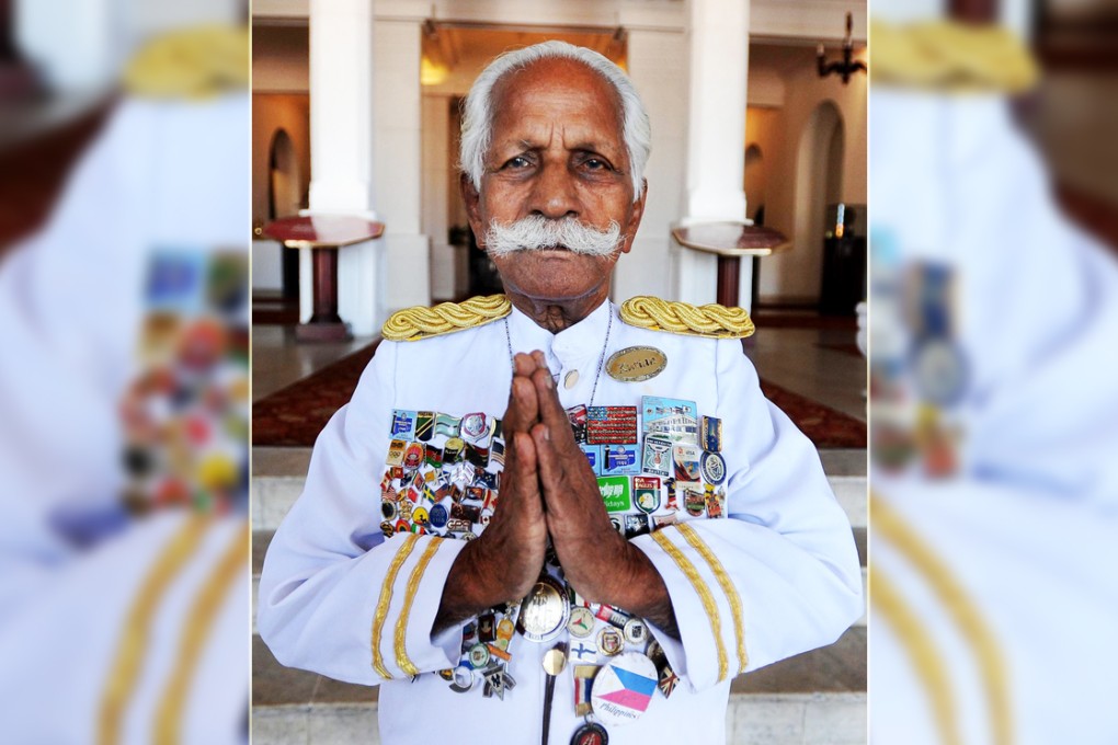 Kottarapattu Chattu Kuttan greets guests in 2010. Photo: AFP