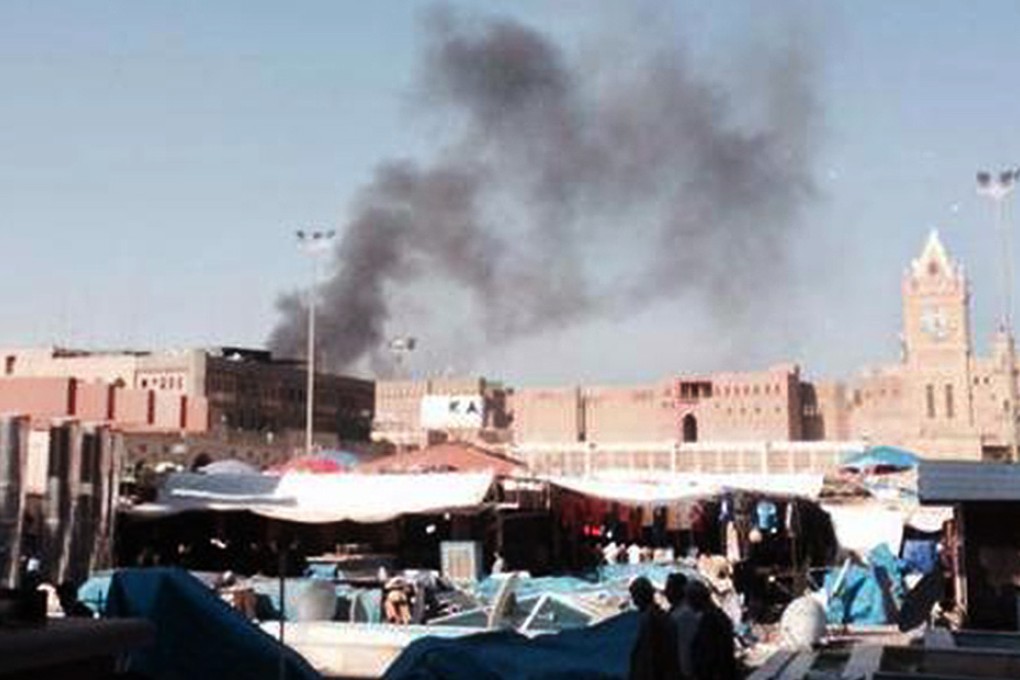Smoke rises above central Arbil. Photo: SCMP Pictures