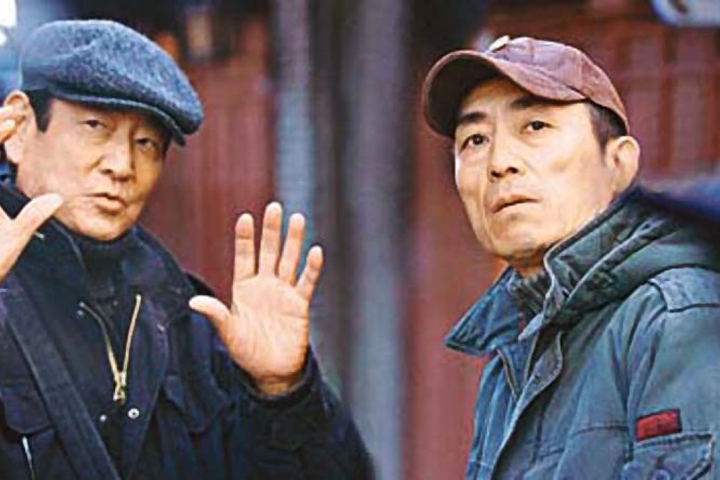 Ken Takakura (left) and Chinese director Zhang Yimou. Photo: Weibo