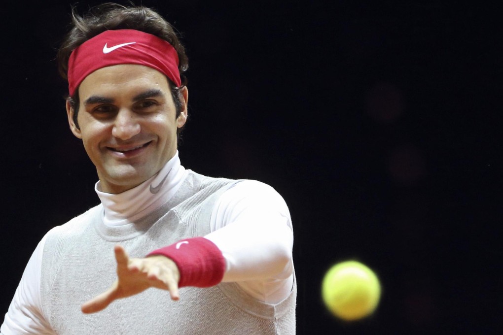 Roger Federer trains with the Swiss Davis Cup team. Photo: Reuters