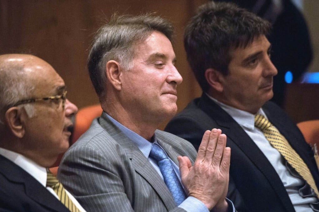 Eike Batista (centre) in the Rio court.