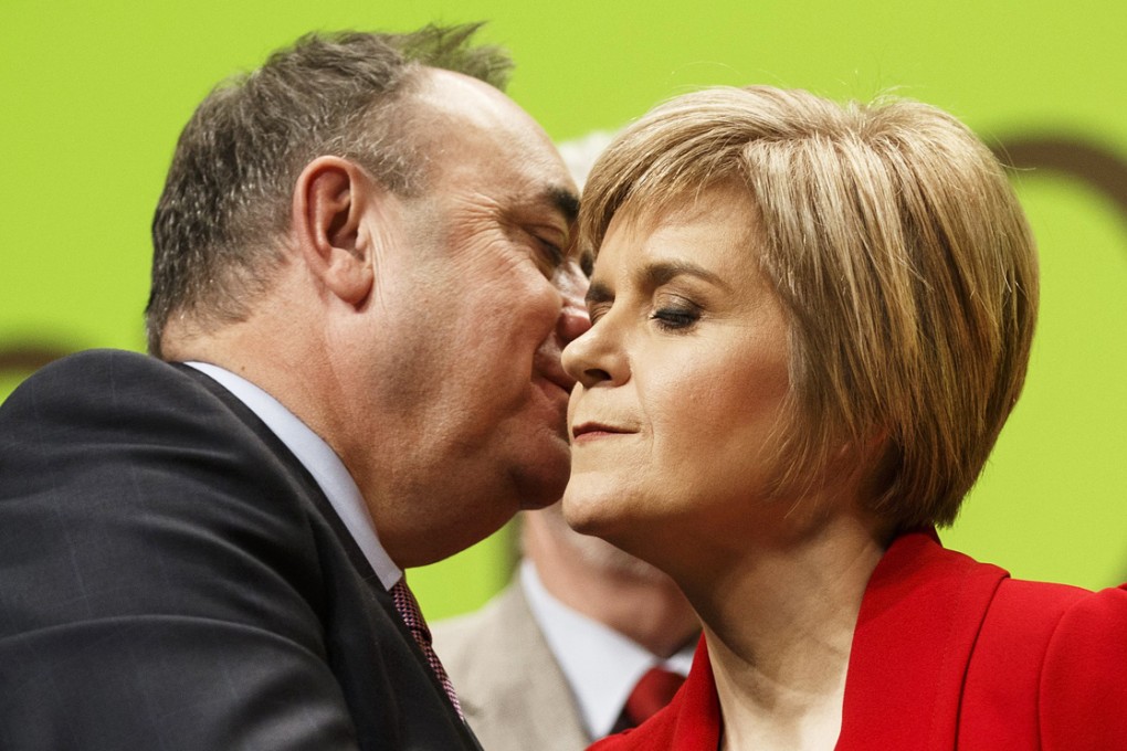 Alex Salmond (left) and Nicola Sturgeon at the annual Scottish National Party (SNP) conference in Perth, Scotland, Britain. Photo: EPA