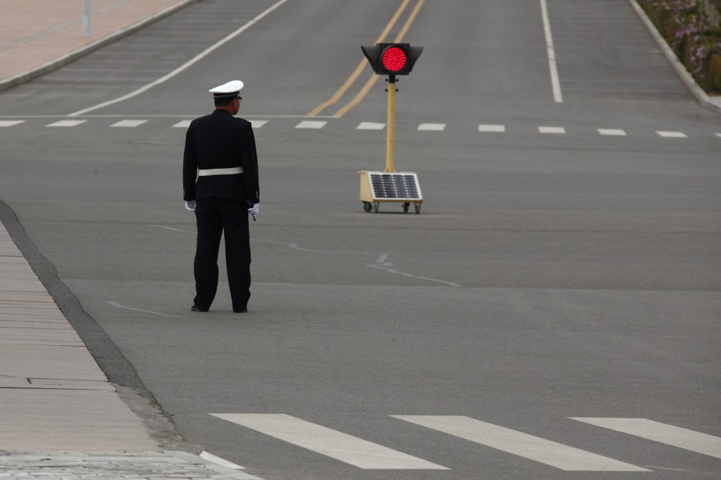 A Shenzhen traffic policeman has been arrested for alleged rape, the Southern Metropolis News reports. Photo: Reuters