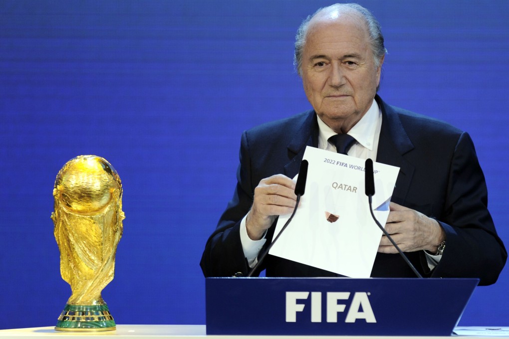 Flashback to December 2010 with Fifa president Sepp Blatter holding the name of Qatar during the official announcement of the 2022 World Cup host country at Fifa headquarters in Zurich. Critics say the credibility of football is "suffering enormously" under Blatter's regime. Photos: AFP