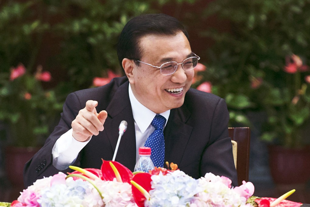Premier Li Keqiang announced that the government would strengthen efforts to lower companies' funding costs while widening their access to capital. Photo: Xinhua