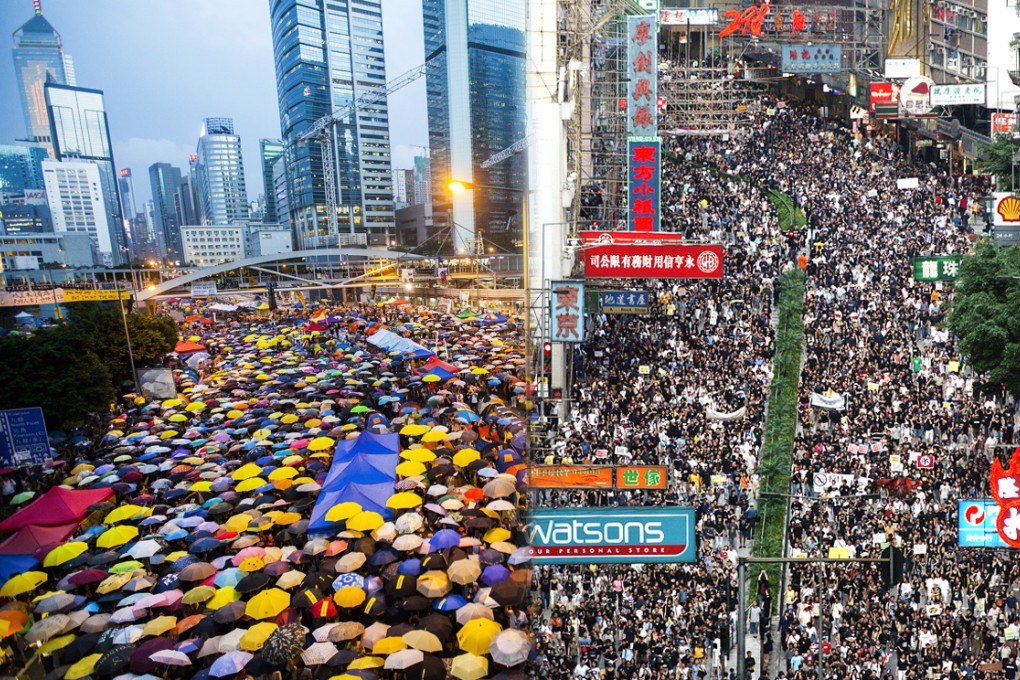 People in Hong Kong feared the passing of “Internet Article 23”. The original Article 23 is a controversial national security bill that provoked half a million Hong Kong people to protest in the streets in 2003 (right). And because people started sharing yellow umbrella pictures (left), Instagram is now the latest member to the club of global internet platforms that are blocked in China, joining Facebook, Twitter and YouTube, amongst others. Photos: Martin Chan, EPA