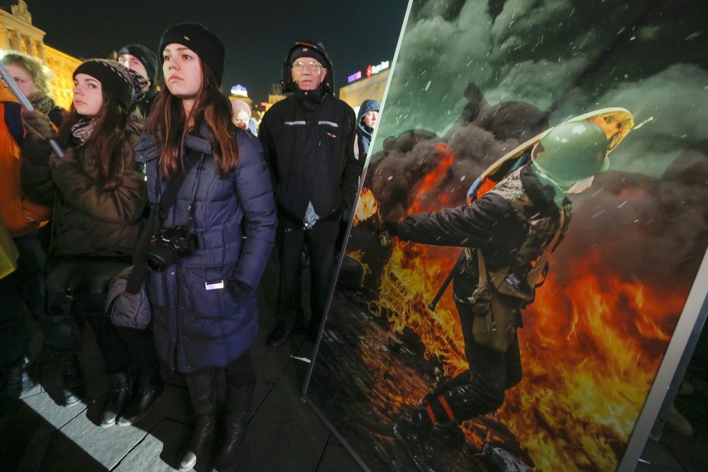 Ukrainians mark the first anniversary of the Maidan revolution at Independence Square in Kiev. Photo: EPA
