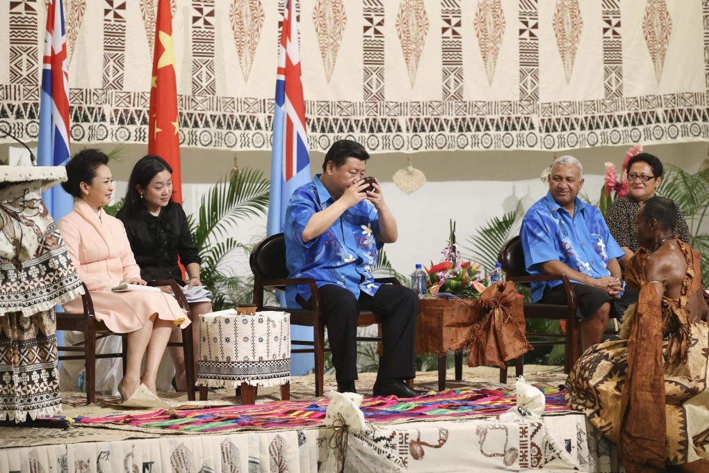 President Xi Jinping attends a welcoming ceremony hosted by Fijian Prime Minister Frank Bainimarama in Nadi on Friday. Photo: Xinhua