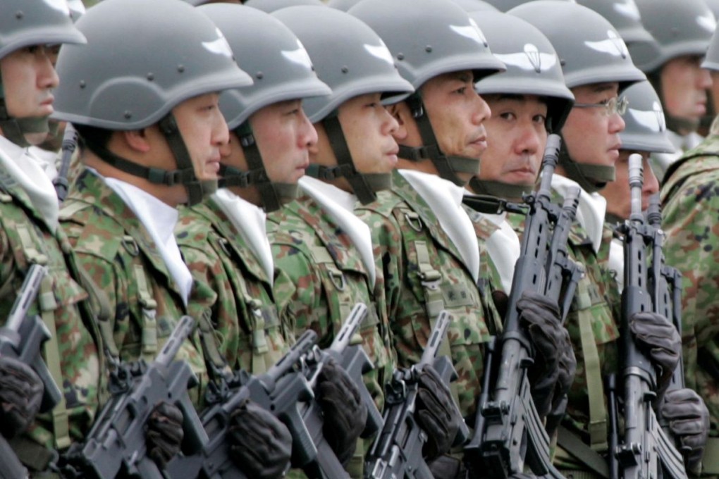 Japan's Ground Self Defence Force (JGSDF) soldiers line up during a ceremony in Asaka, north of Tokyo. Photo: Reuters