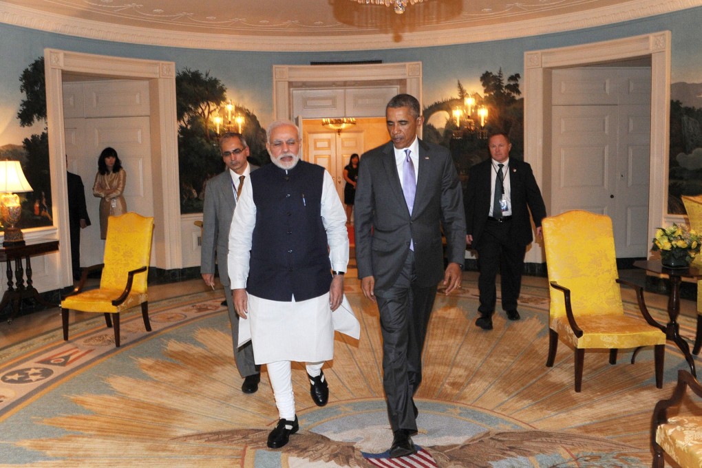 Indian Prime Minister Narendra Modi walks with US President Barack Obama at the White House in Washington, DC, on September 29, 2014. Photo: AFP