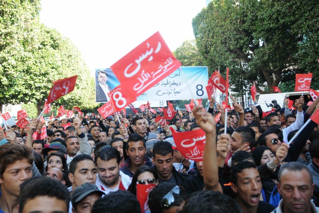 People attend a publicity activity for the upcoming presidential elections in Tunis, capital of Tunisia. Photo: Xinhua