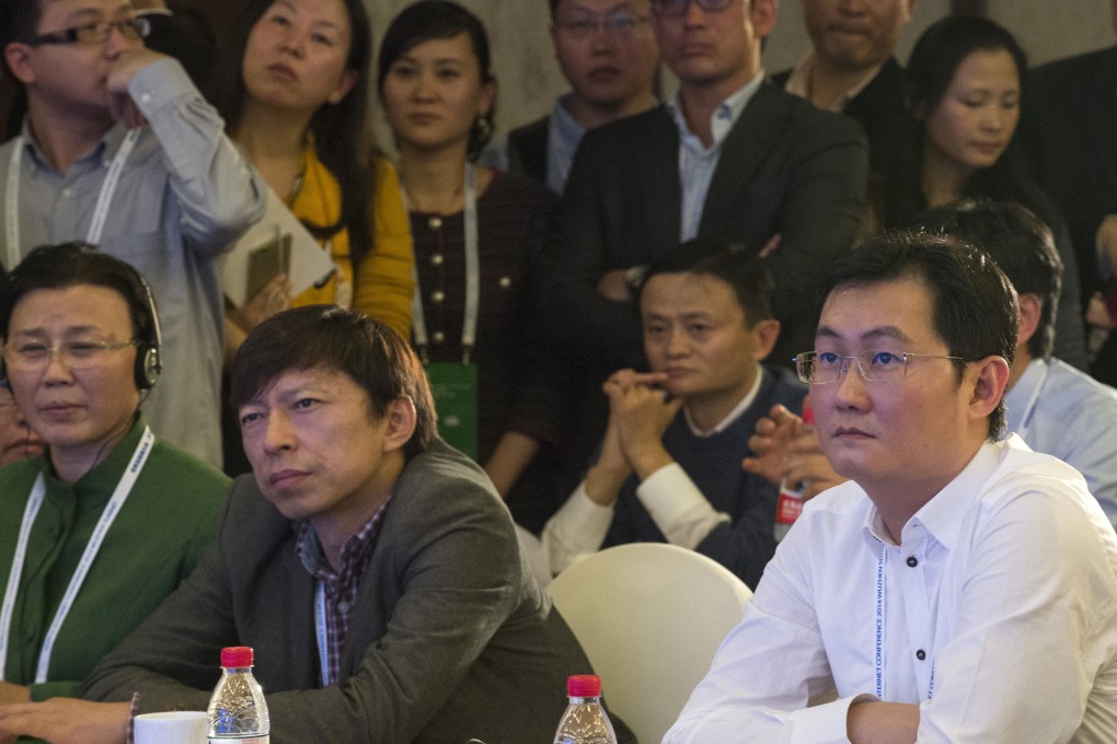 Ma Huateng (right), chairman of Tencent, Jack Ma (2nd right), executive chairman of Alibaba, and Charles Zhang, chairman of Sohu Inc., attend the World Internet Conference in Wuzhen. Photo: Xinhua