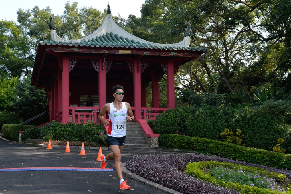 Ivan Lo Ching-hin in command during the men’s senior race at the Hong Kong Cross Country Championship at Hong Kong Golf Club. Photo: Richard Castka