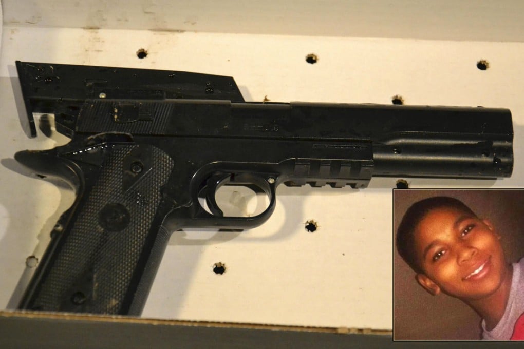 Tamir Rice (inset), 12, was shot dead after waving this replica gun.