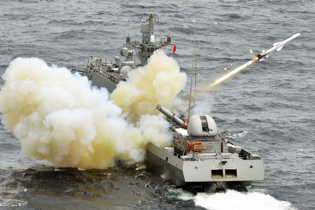 A South Korean guided missile patrol gunboat fires a harpoon missile during a live-firing exercise at the sea off the islands of Dokdo, which are known as Takeshima in Japanese. Photo: Reuters