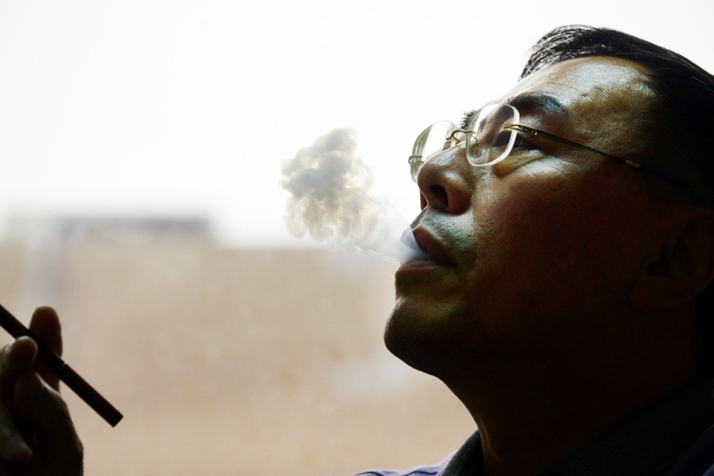 Hon Lik is acknowledged among industry commentators as the first person to develop a viable commercial version of the electronic cigarette. Photo: AFP