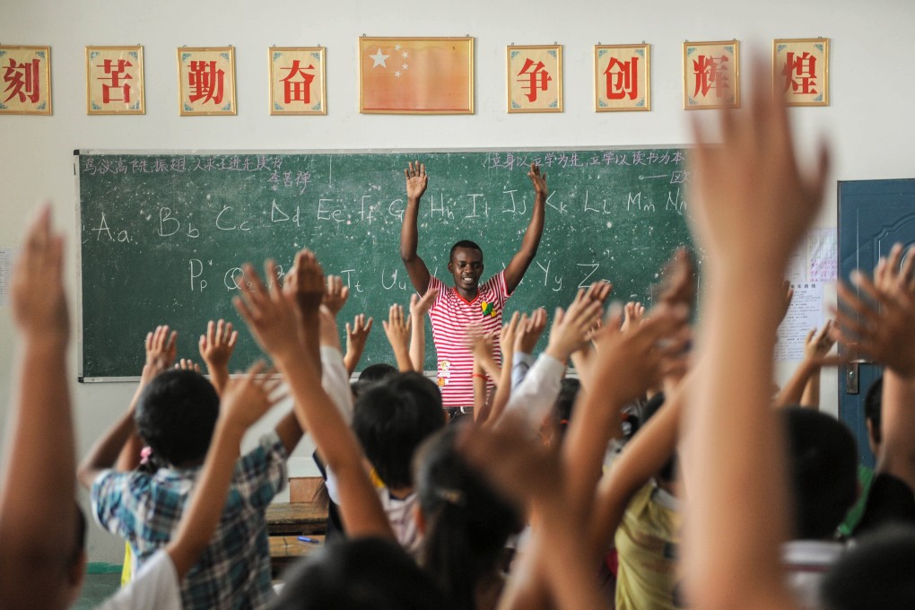 Schoolchildren in Zhejiang province learning English. The improvement in mainland China's English proficiency is not surprising. Photo: Xinhua