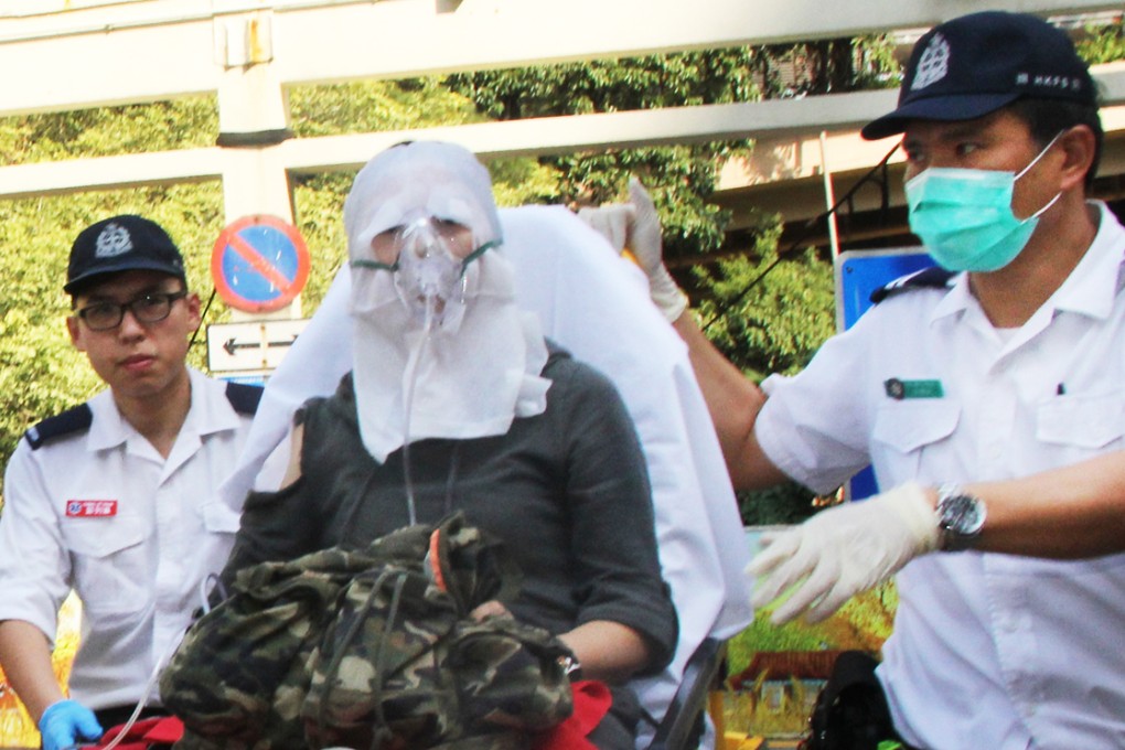 A victim is taken to hospital after the attacks in San Po Kong and Tsz Wan Shan. Photo: SCMP Pictures