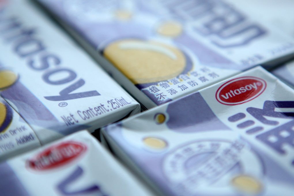 Cartons of Vitasoy are lined up in Beijing as the company reported a 22 per cent increase in net profit. Photo: Bloomberg