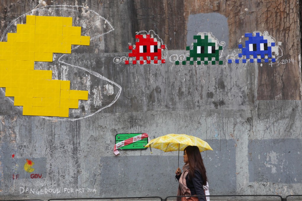 Wall art by Invader in Fortress Hill. Photo: Nora Tam