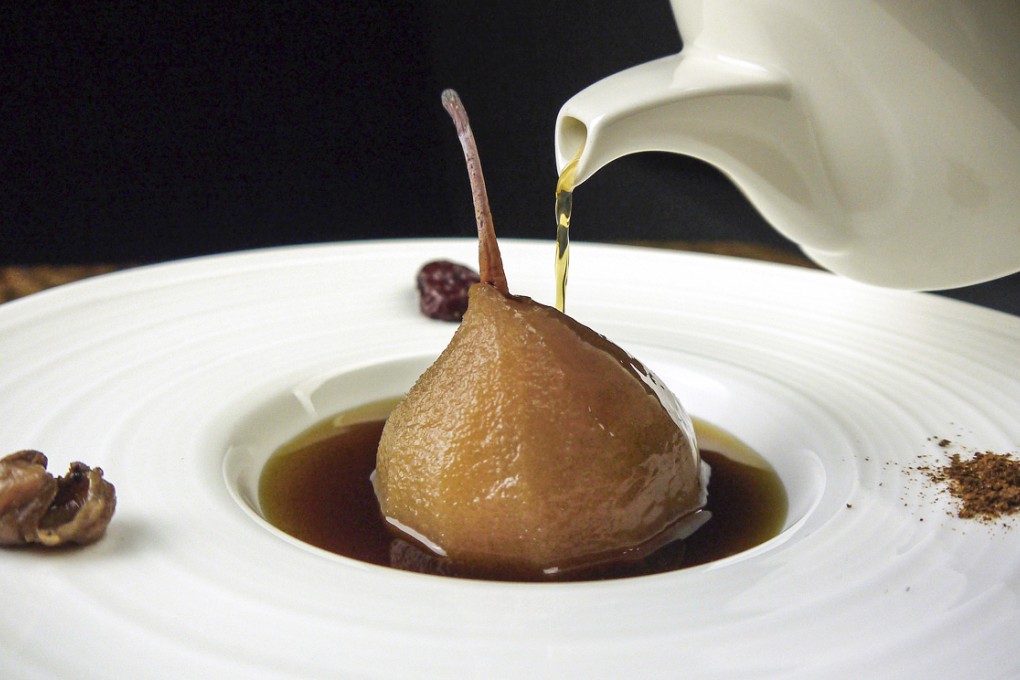 Triple wild mushroom consommé and poached baby pear.