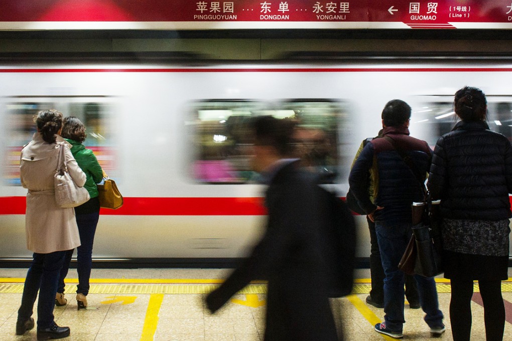 The Chinese government will continue to partly subsidise the cost of travelling on Beijing's subway and buses, despite next month's planned changes. Photo: Xinhua