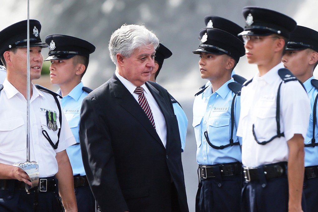 Commissioner on Interception of Communications and Surveillance Mr Justice Darryl Saw (centre) noted 10 cases of "non-compliance" or "irregularities". Photo: Sam Tsang