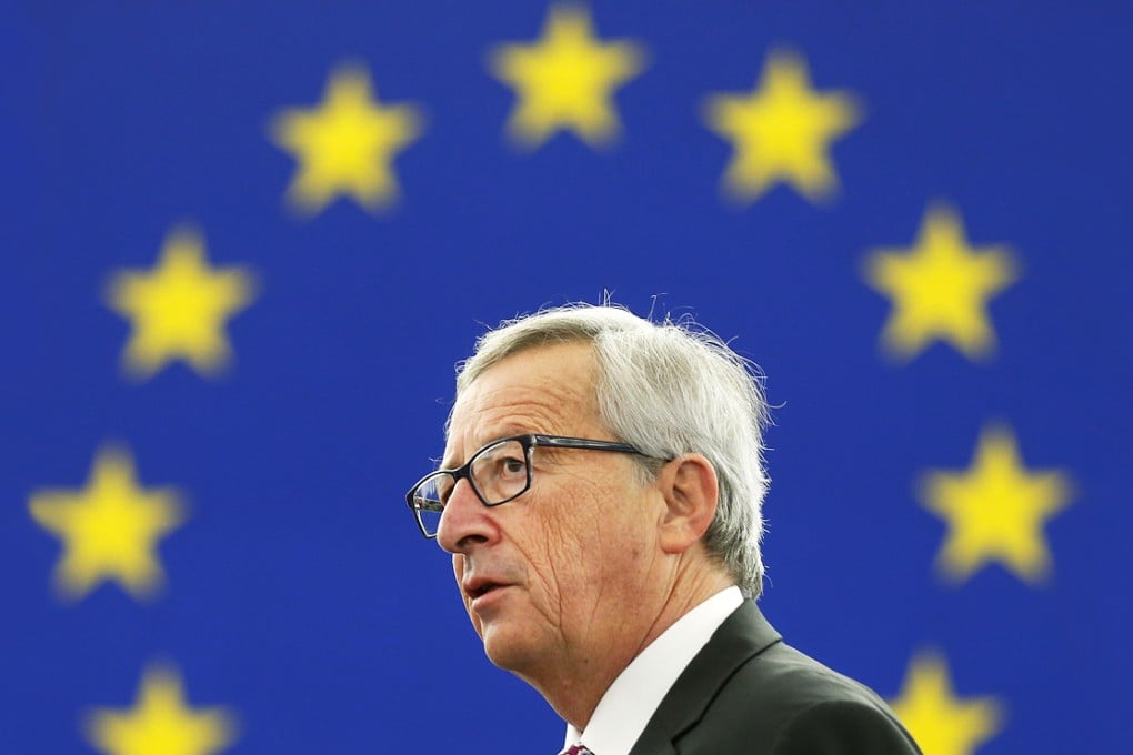 EU Commission chief Jean-Claude Juncker (right) speaks to unveil an eagerly awaited €315 billion (HK$3 trillion) investment plan to "kick-start" the economy. Photo: Reuters