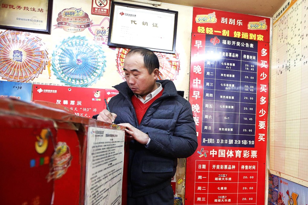Sales of lottery tickets on the mainland are booming - generating more than 312 billion yuan (about HK$395 billion) in the first 10 months of this year. Photo: Reuters