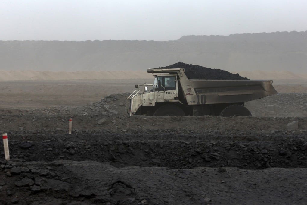 A truck carries coal from a mine in Mongolia. Losses in Mongolia Energy ballooned, mainly due to impairment charges on its mining and exploration rights. Photo: Bloomberg