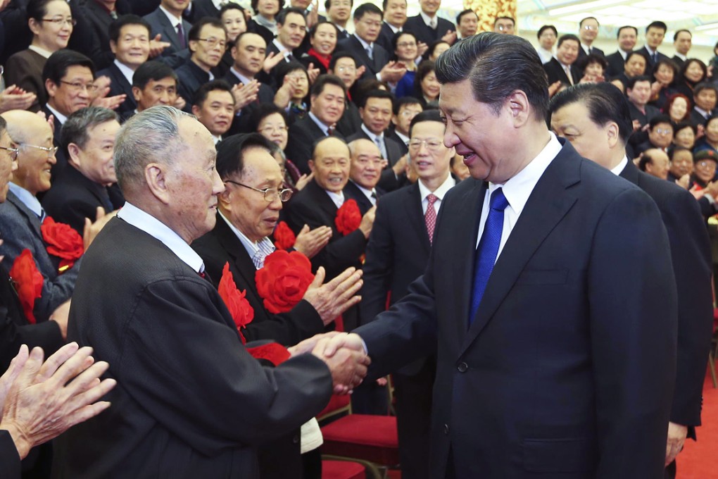 President Xi Jinping shakes hands with Communist Party veterans at a gathering at the Great Hall of the People in Beijing yesterday. Photo: Xinhua