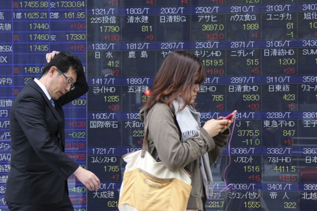 Nomura Holdings predicts Japanese investors will inject US$34 billion into Asian stocks and bonds over the next two years. Photo: AP