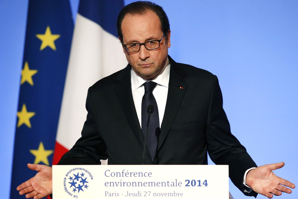 French President Francois Hollande delivers his speech during the Environmental Conference at the Elysee Palace in Paris. Photo: Reuters