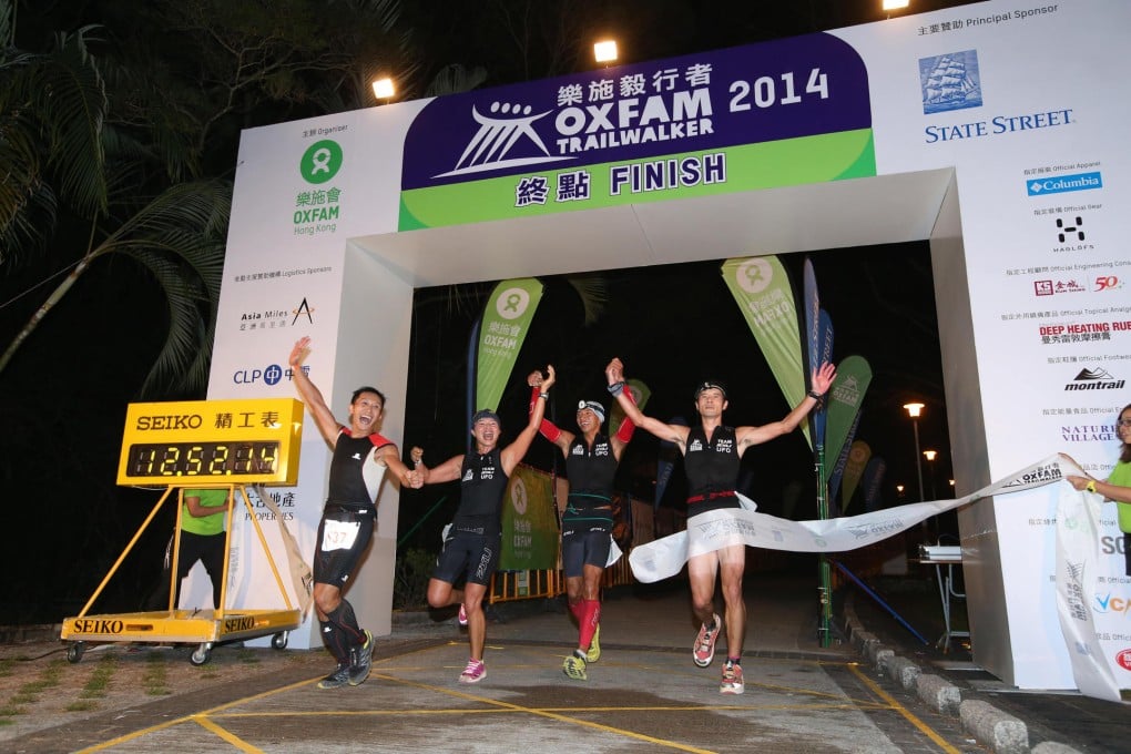 Wyan Chow Pui-yan (second left) and her Team 2XU UFO celebrate finishing fourth in the Oxfam Trailwalker. Photos: Fuse Choy