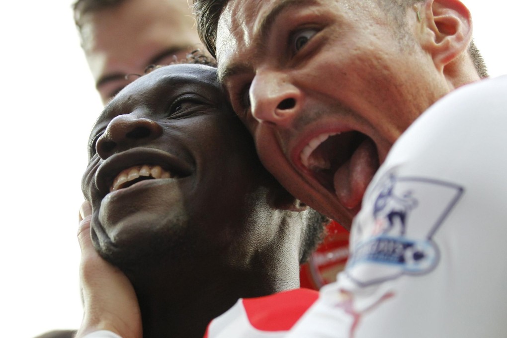 Arsenal's Danny Welbeck celebrates his goal with striker Olivier Giroud during their match against West Bromwich Albion. Photos: AFP