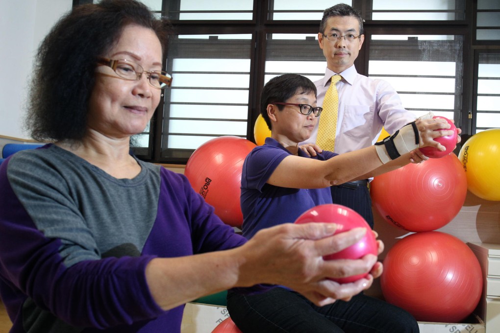 (From left) Patients Tsang Yim-ching and Daisy Cheung try some physiotherapy exercises with Arthritis & Rheumatism Foundation chairman Dr Chan Tak-hin. Photo: May Tse