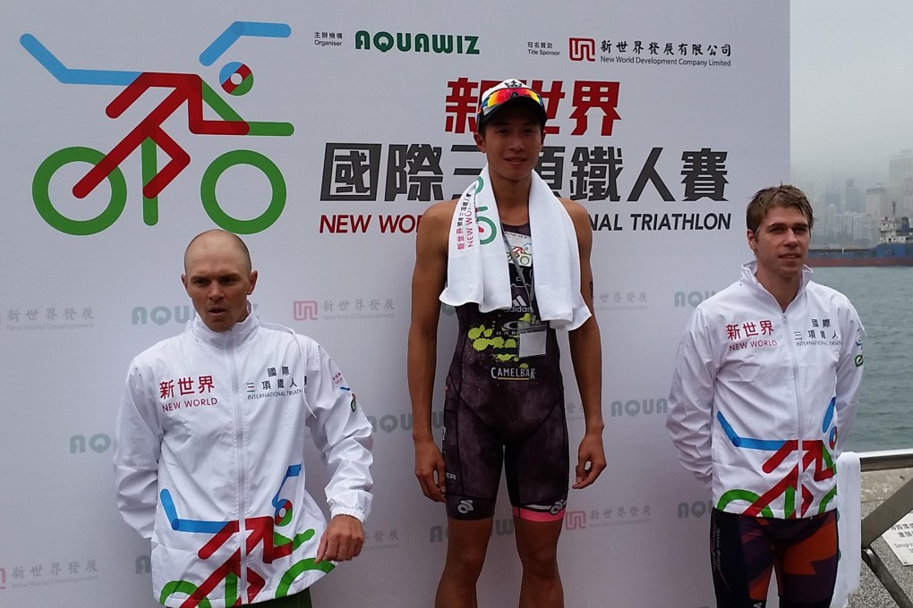 Hong Kong's Ivan Lo stands on the winning podium after his victory on Sunday. Photo: SCMP Pictures