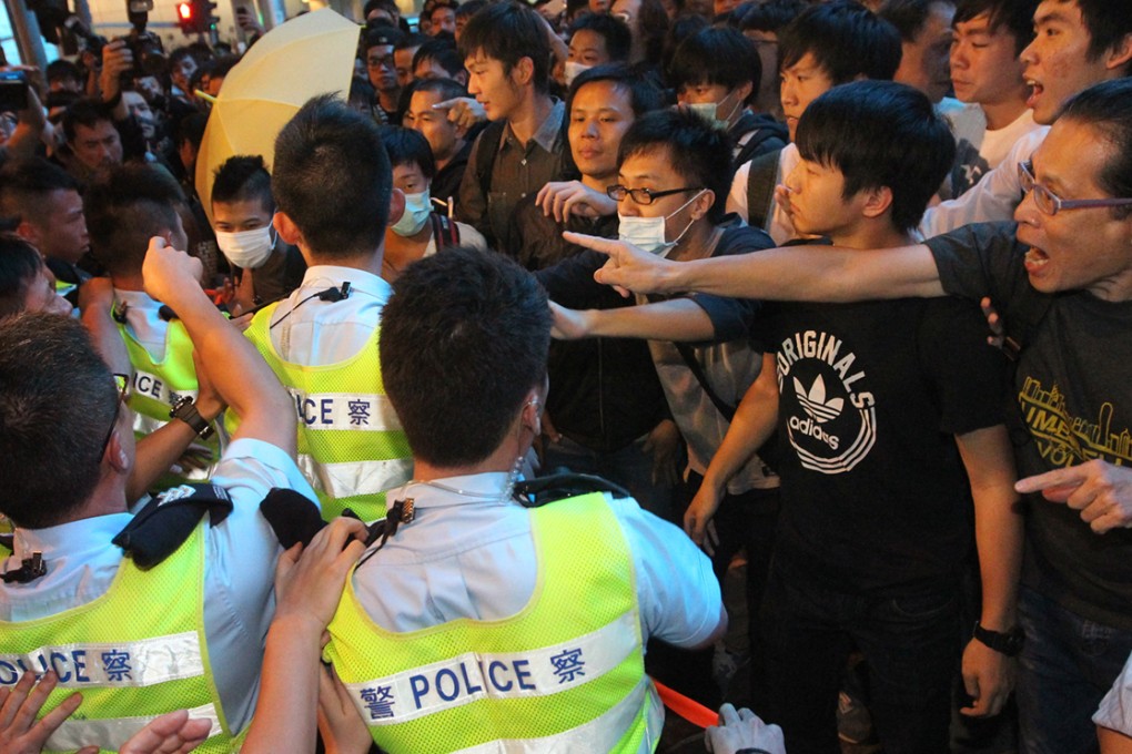 Police officers clash with pro-democracy protesters in Mong Kok. Photo: Edward Wong
