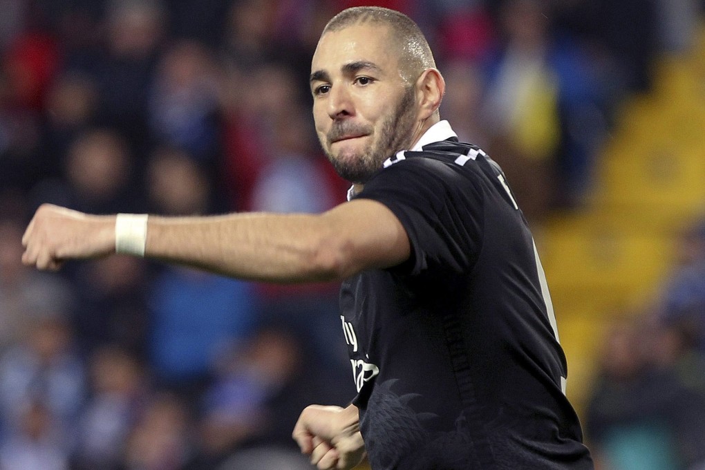 Karim Benzema celebrates the opener. Photo: EPA