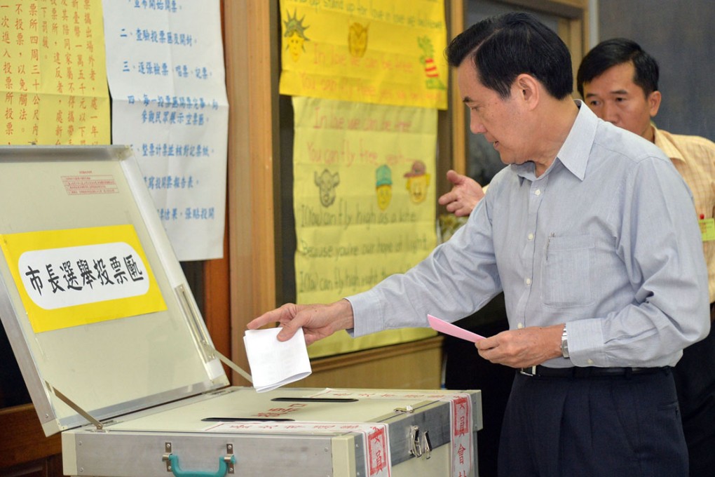 Taiwan President Ma Ying-jeou cast his ballot at polling station in Taipei. Photo: AFP