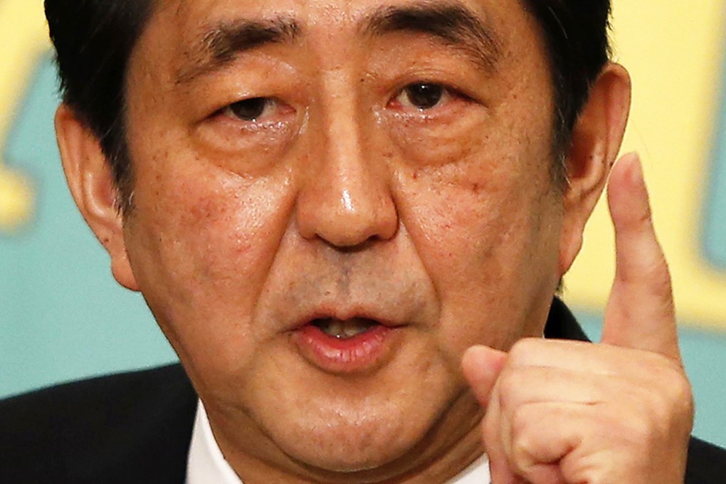 Prime Minister Shinzo Abe said a planned sales tax rise set for next year would be delayed and has called a snap election. Photo: Reuters