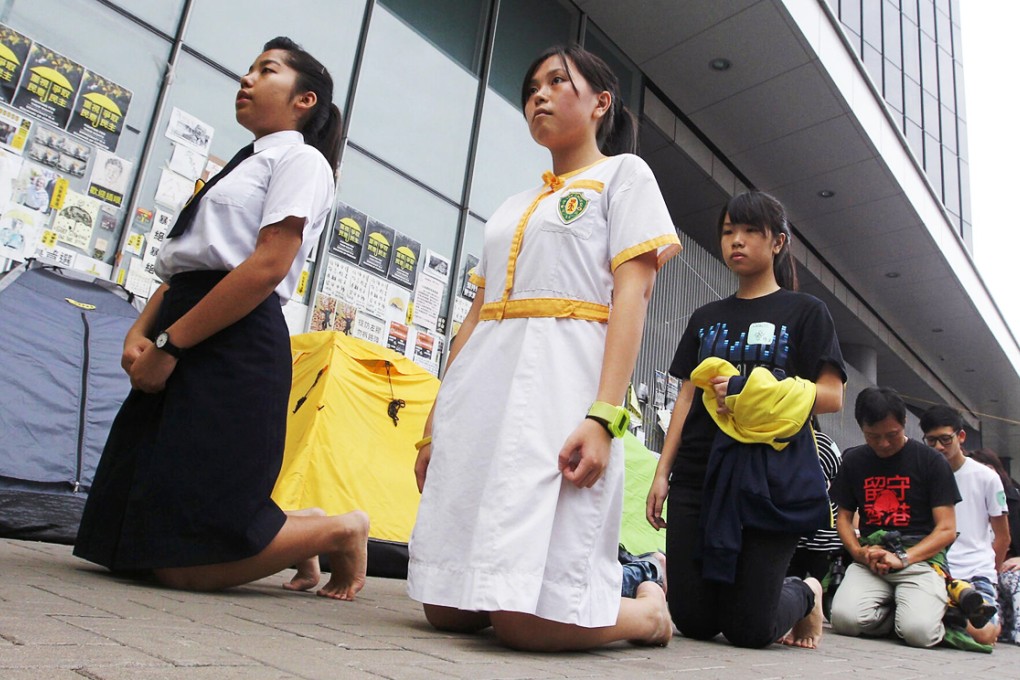 Students in an "ascetic walk" outside Legco. Photo: Edward Wong