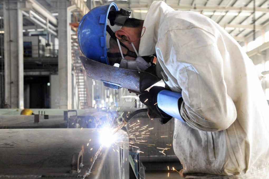 Growth in mainland factories stalled last month as output shrank for the first time in six months, reinforcing expectations of more aggressive support measures. Photo: Reuters