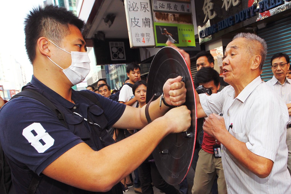 Protesters clash with each other in Mong Kok. Photo: Edward Wong