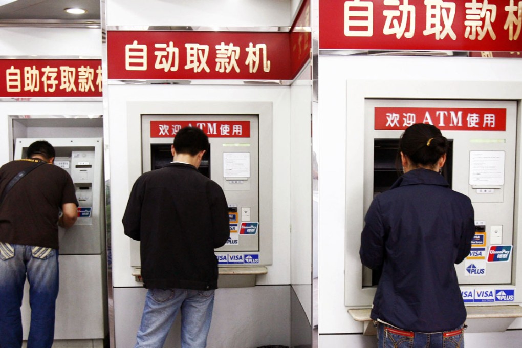 Analysts say the deposit insurance scheme will have a bigger impact on the results of smaller banks. Photo: Reuters