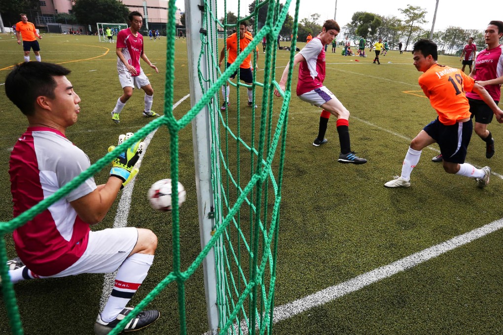 More than 100 goals were scored as players put their bodies on the line to raise money for Operation Santa on a hot day in Pok Fu Lam. Photo: Jonathan Wong