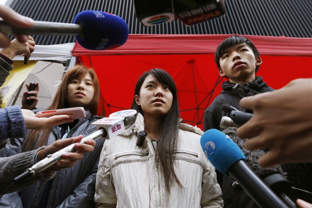 Isabella Lo (left), Prince Wong and Joshua Wong speak to the media yesterday. Photo: Reuters
