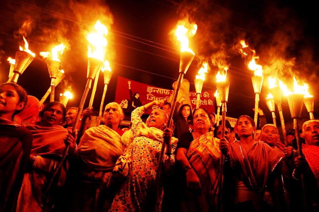 Survivors and relatives of the Bhopal gas accident attend a torchlight rally on the 30th anniversary of the tragedy, which killed 3,500 in the immediate aftermath. Photo: EPA